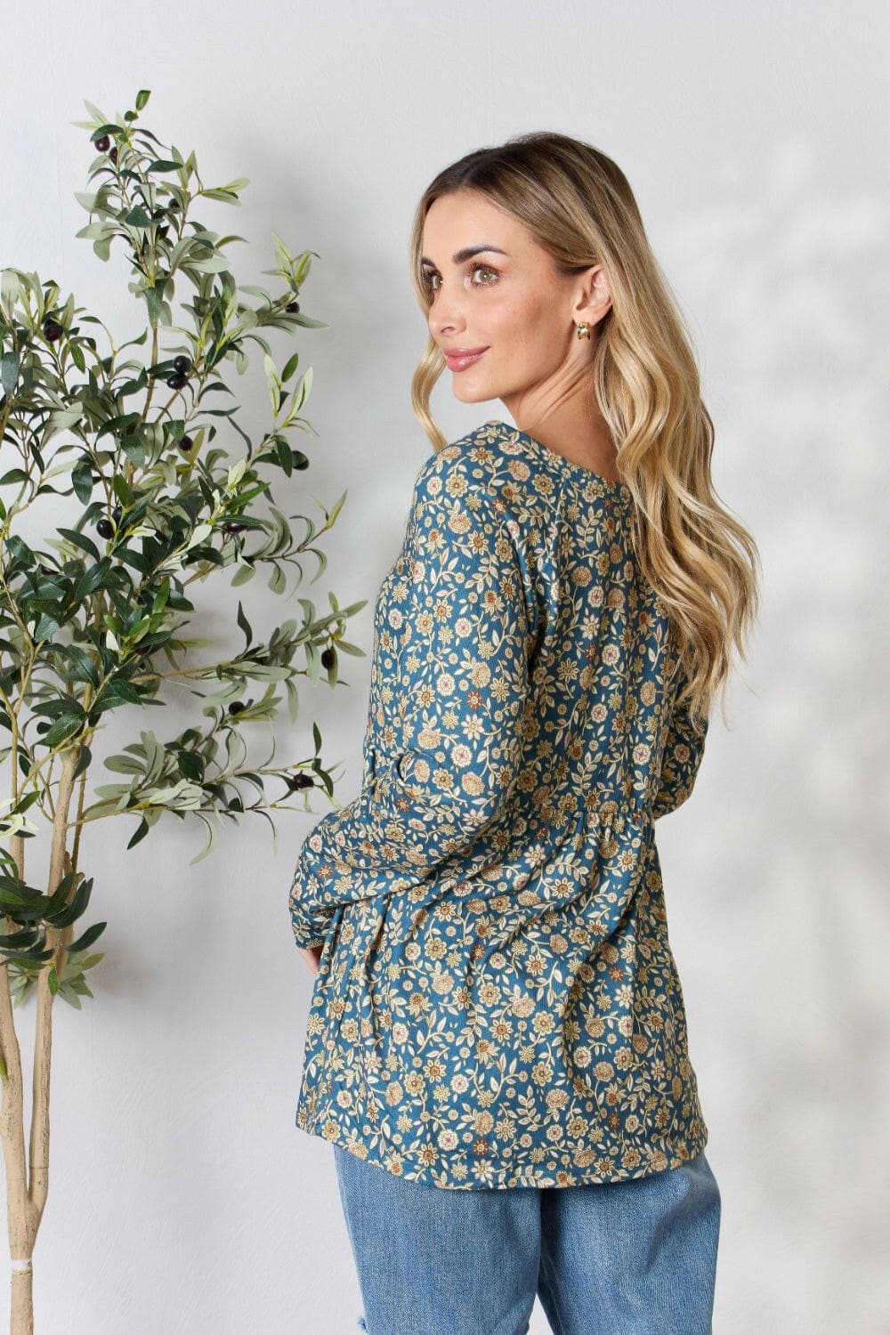 Heimish Full Size Floral Half Button Long Sleeve Blouse.