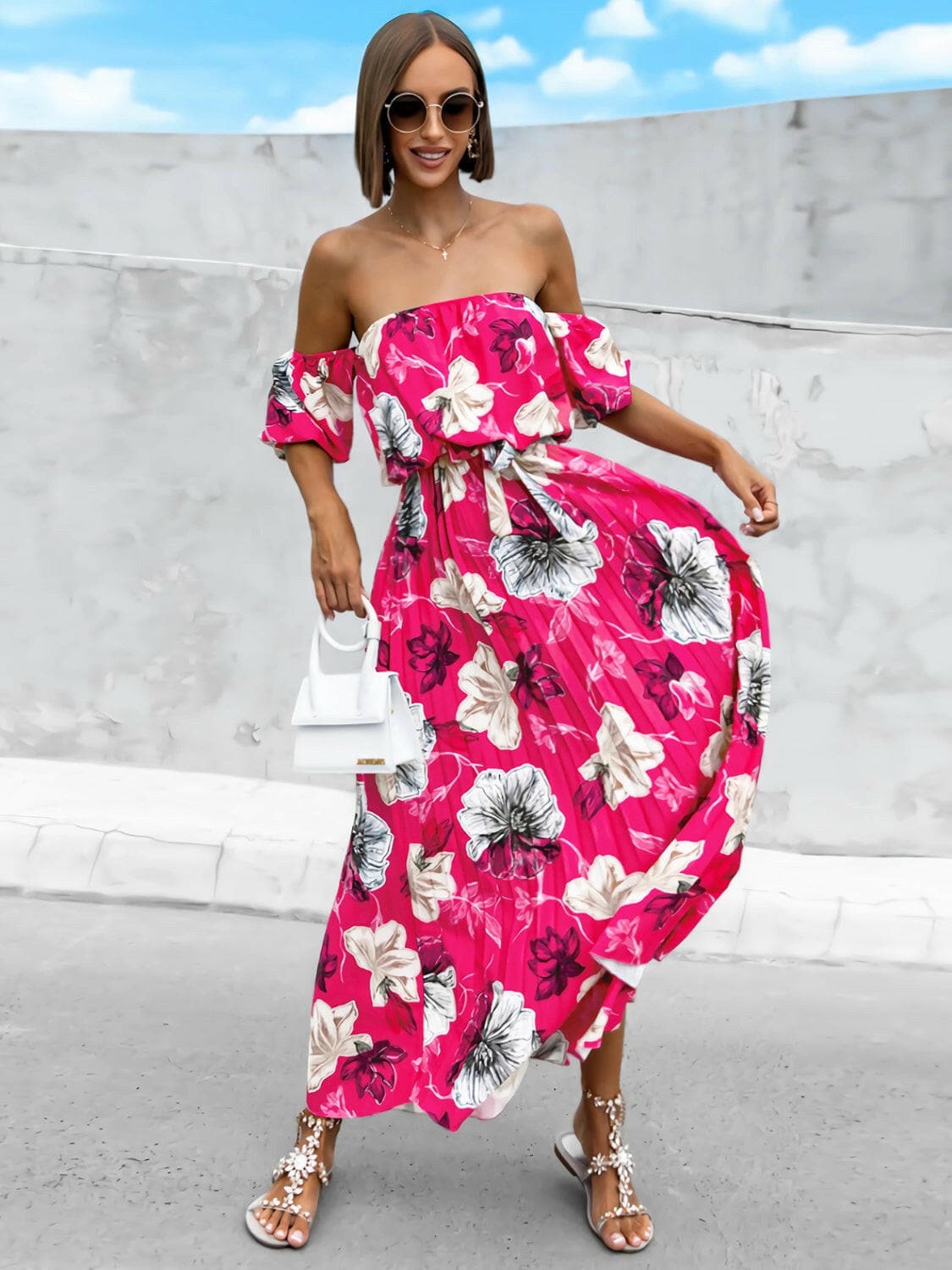 Pleated Floral Off-Shoulder Short Sleeve Midi DressPleated Floral Off-Shoulder Short Sleeve Midi Dress
 Step into elegance with our Pleated Floral Off-Shoulder Short Sleeve Midi Dress. Embrace sophistication effortleLove Salve -Shoulder Short Sleeve Midi Dressjust arrived