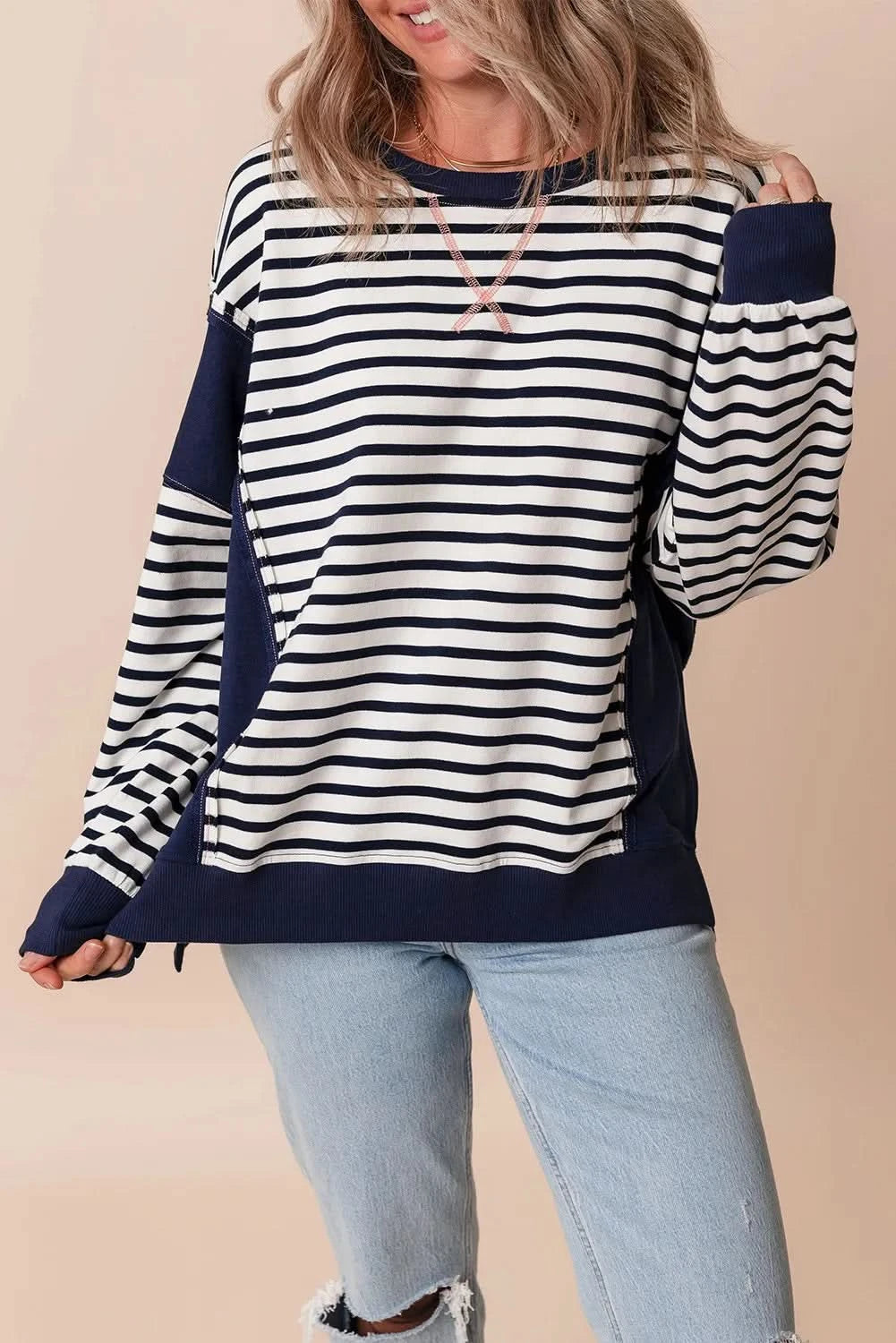 Chic striped long sleeve sweatshirt with exposed seams