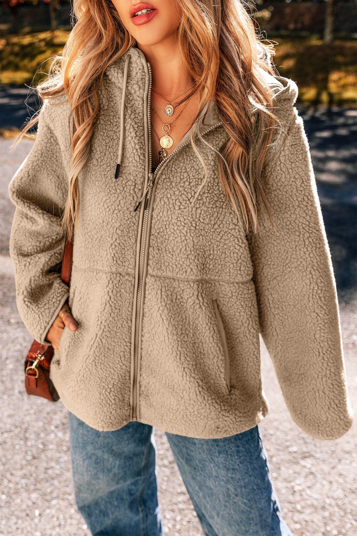 Close-up of the soft fleece material on the Love Salve Hooded Jacket, highlighting its cozy texture and quality.