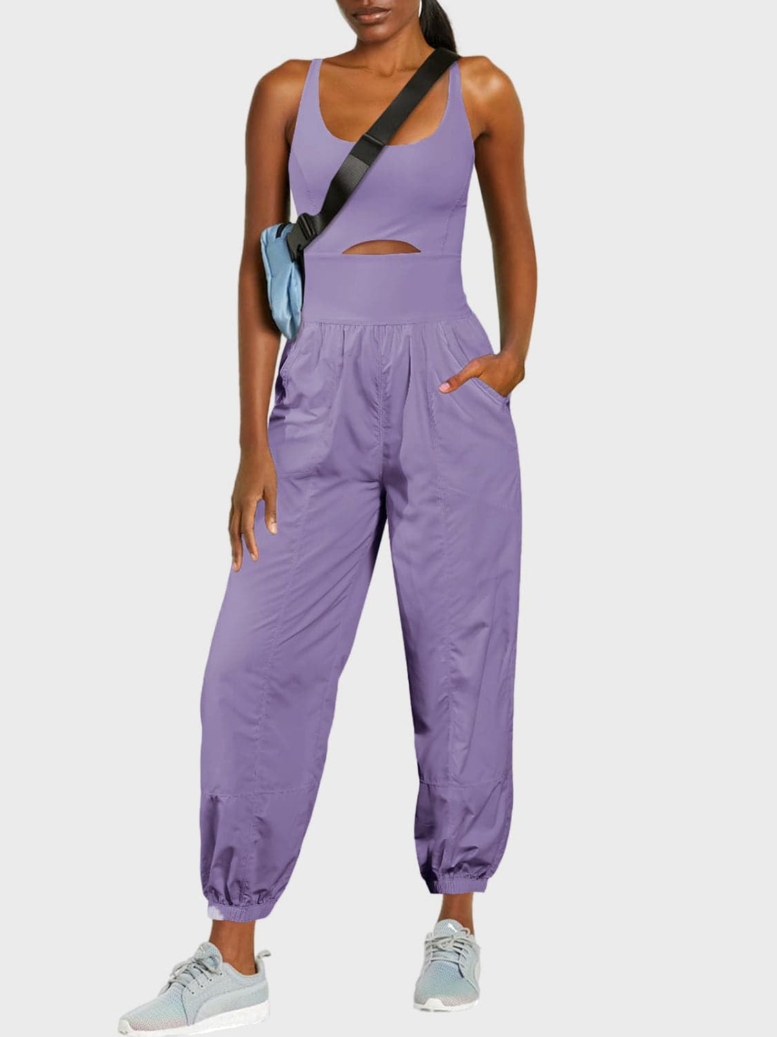 Chic cutout scoop neck jumpsuit with wide straps and pockets