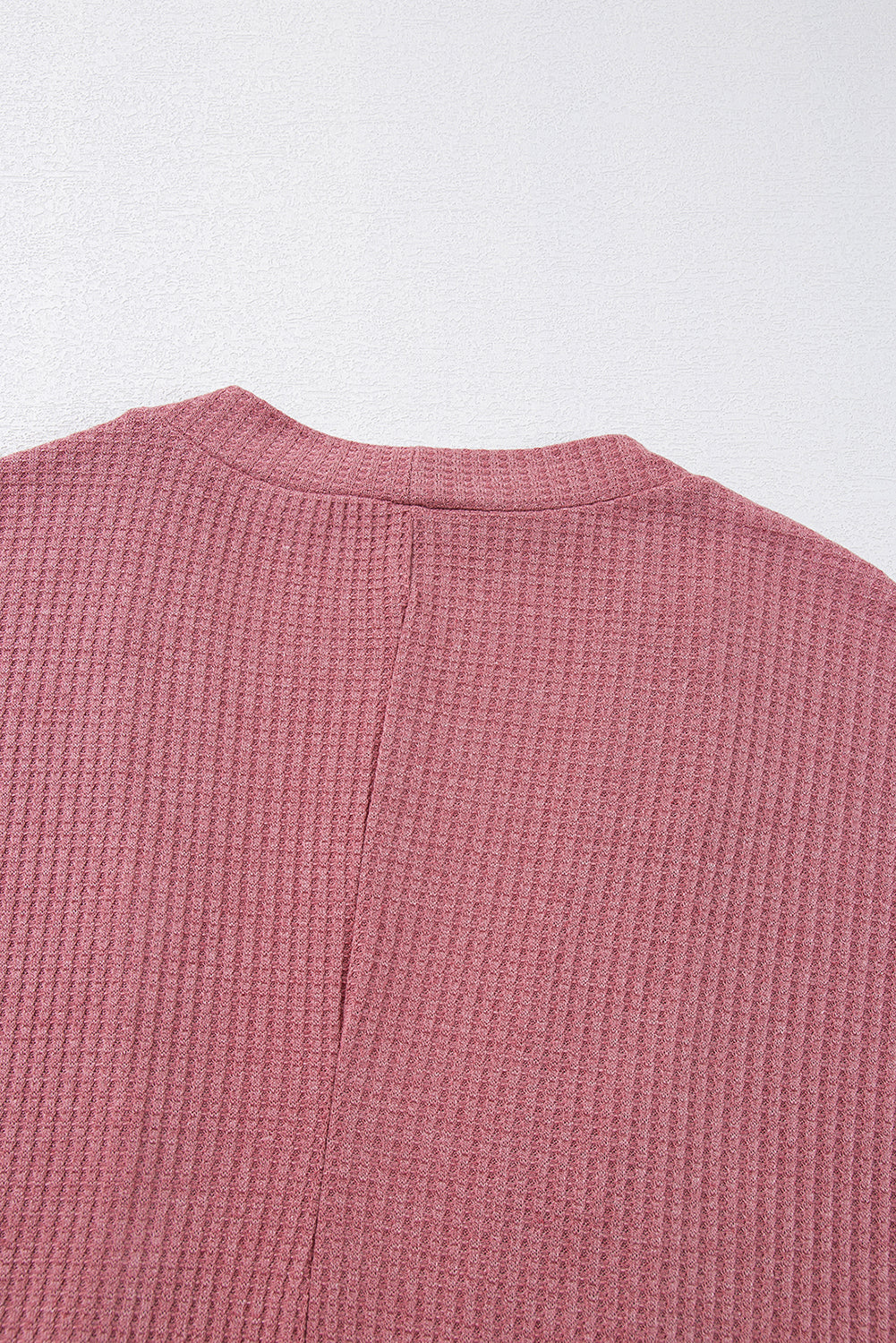 Cozy mineral red waffle knit cardigan with pocket detail