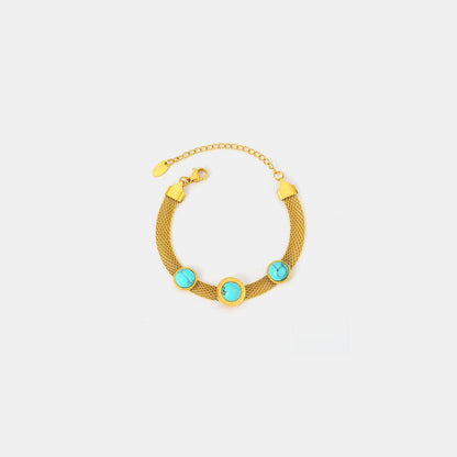 Elegant turquoise and gold-plated titanium bracelet