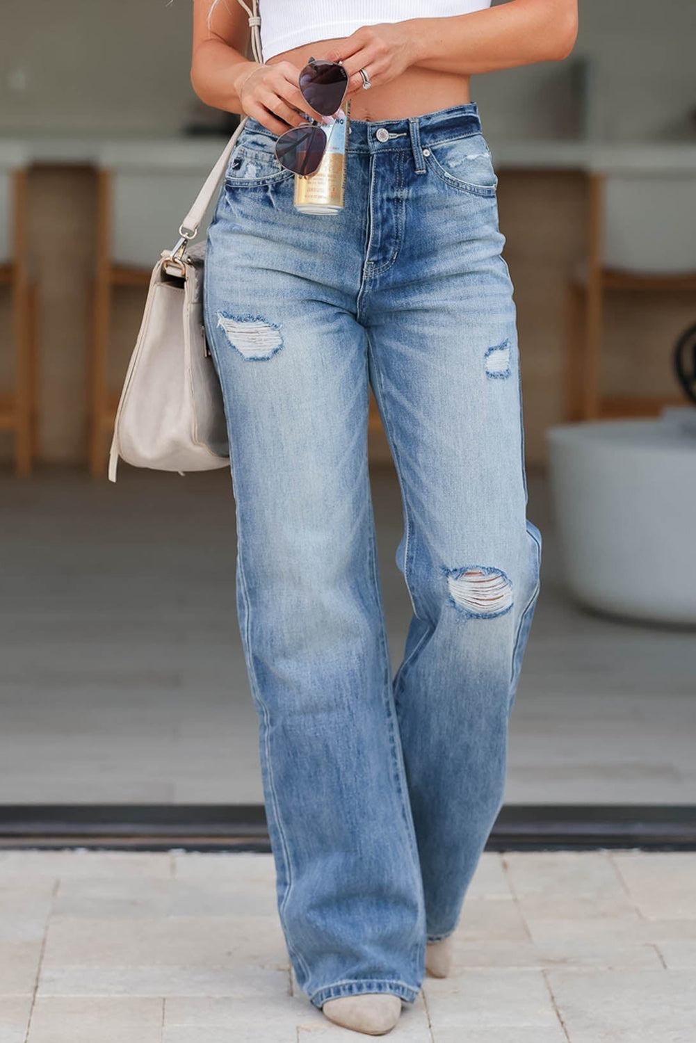 Chic light blue high rise distressed straight-leg denim