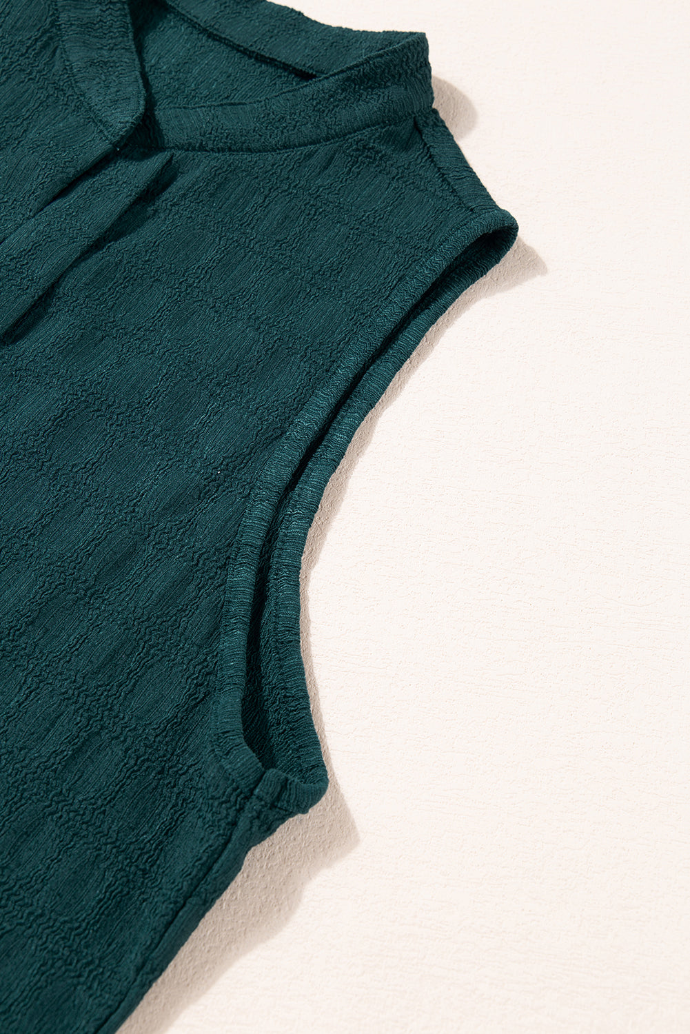 Chic sea green textured tank top with split neckline