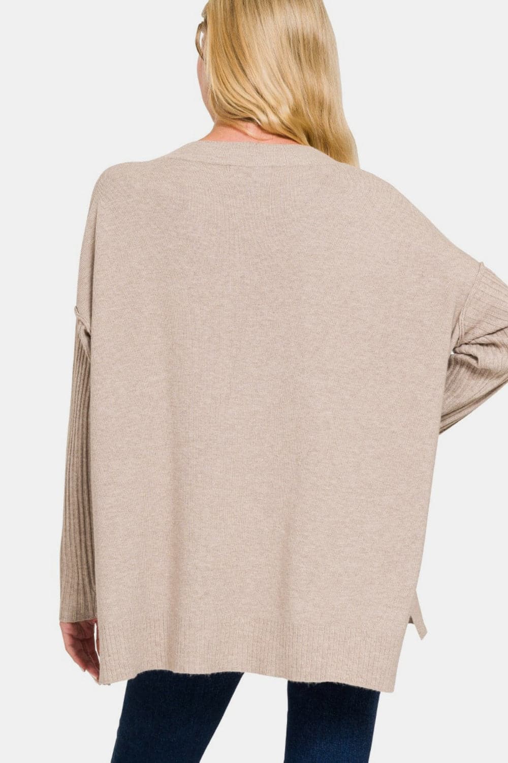 Chic V-neck high-low sweater with side slits