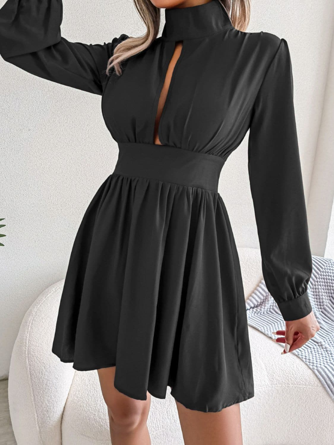 Cutout Turtleneck A-Line Mini Dress.