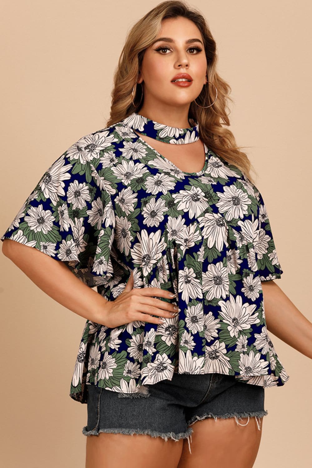 Plus Size Floral Flutter Sleeve Cutout Blouse.