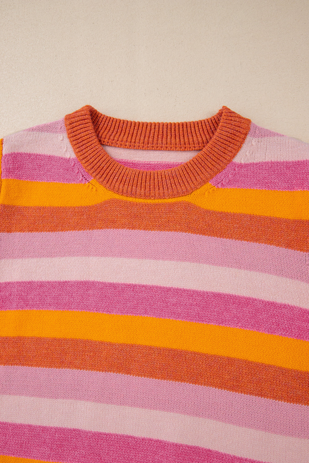 Vibrant orange color block ribbed neck sweater with long sleeves