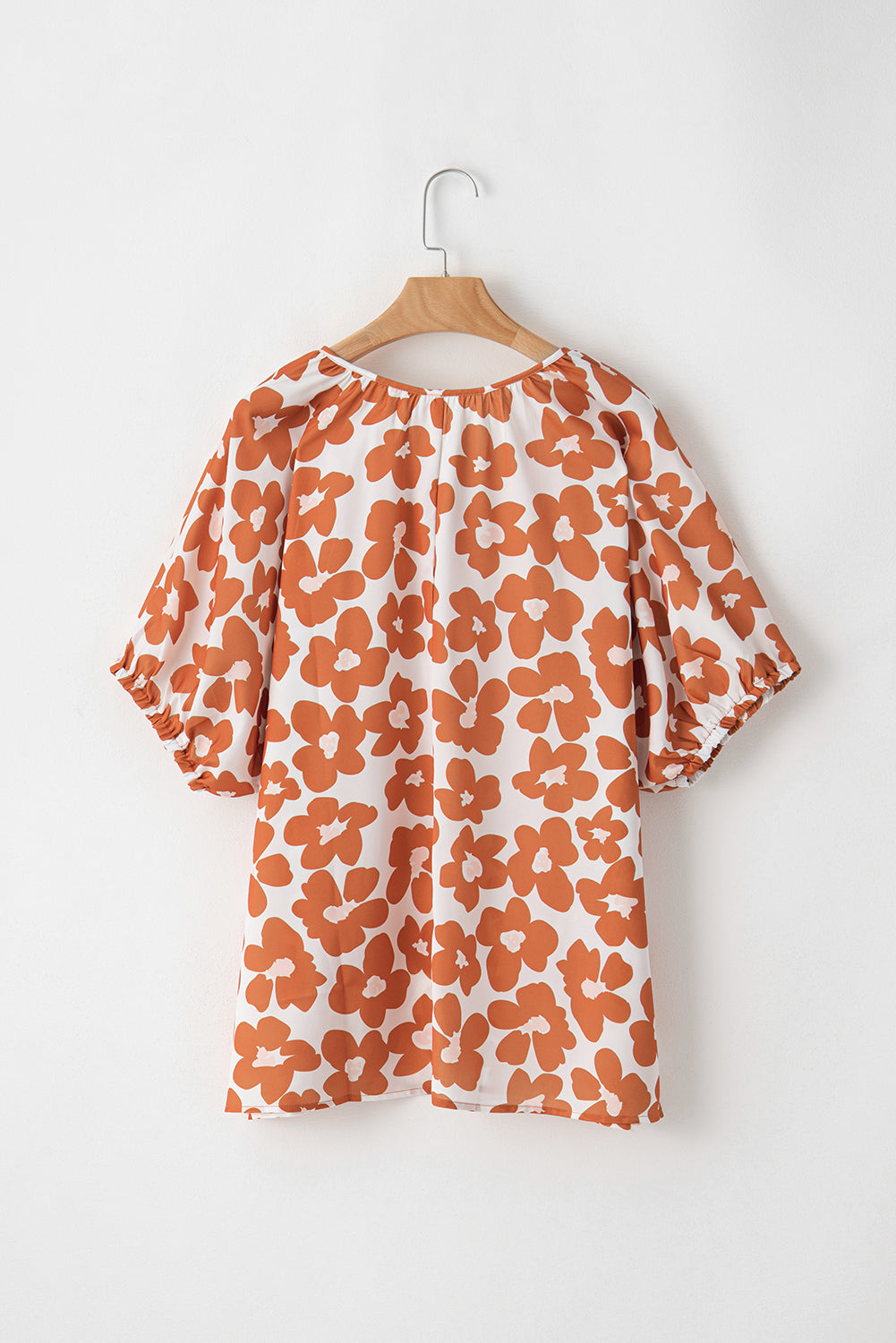 Floral Delight: Plus Size Orange V Neck Blouse with Drawstring Detail