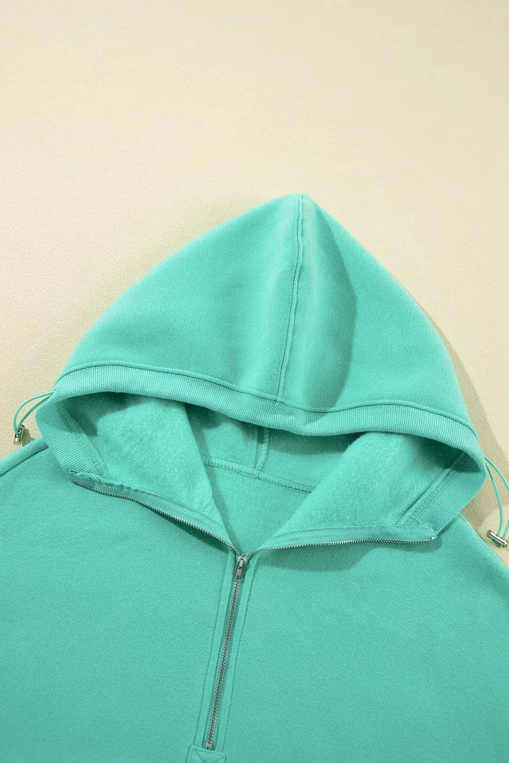 Versatile pocketed half zip hoodie for all-day comfort