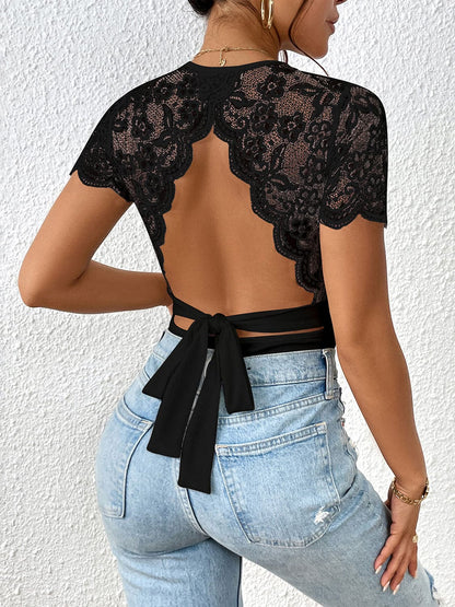 Lace Backless Round Neck Bodysuit.