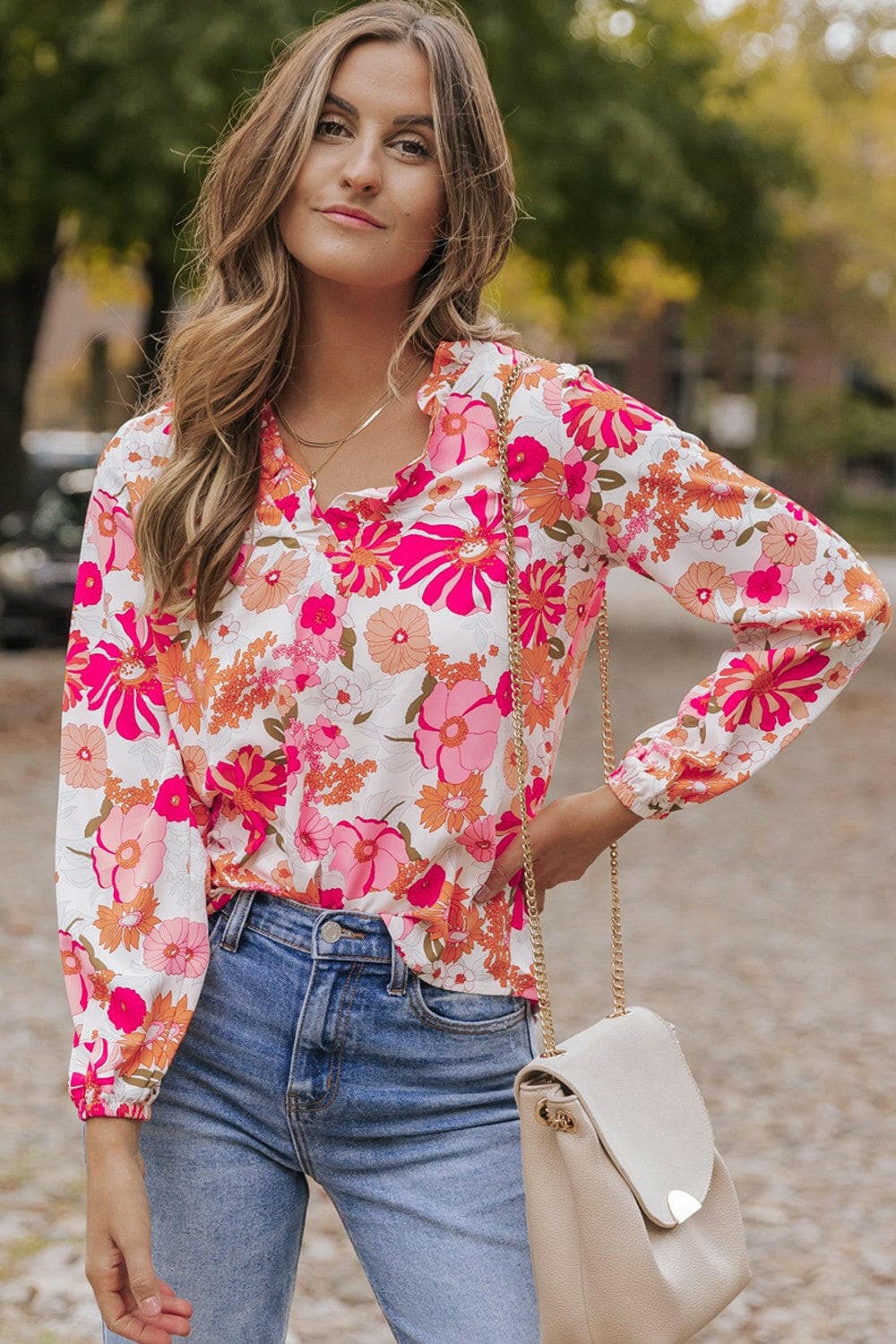 Floral V-Neck Frill Long Sleeve BlouseFloral V-Neck Frill Long Sleeve Blouse
 Indulge in elegance with our Floral V-Neck Frill Long Sleeve Blouse, a versatile piece that seamlessly combines sophisticatioLove Salve -Neck Frill Long Sleeve BlouseBlouses