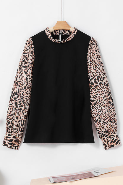 Elegant black lantern sleeve blouse with leopard print accents