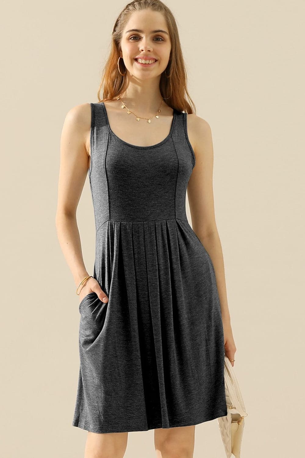 Doublju Full Size Round Neck Ruched Sleeveless Dress with Pockets.