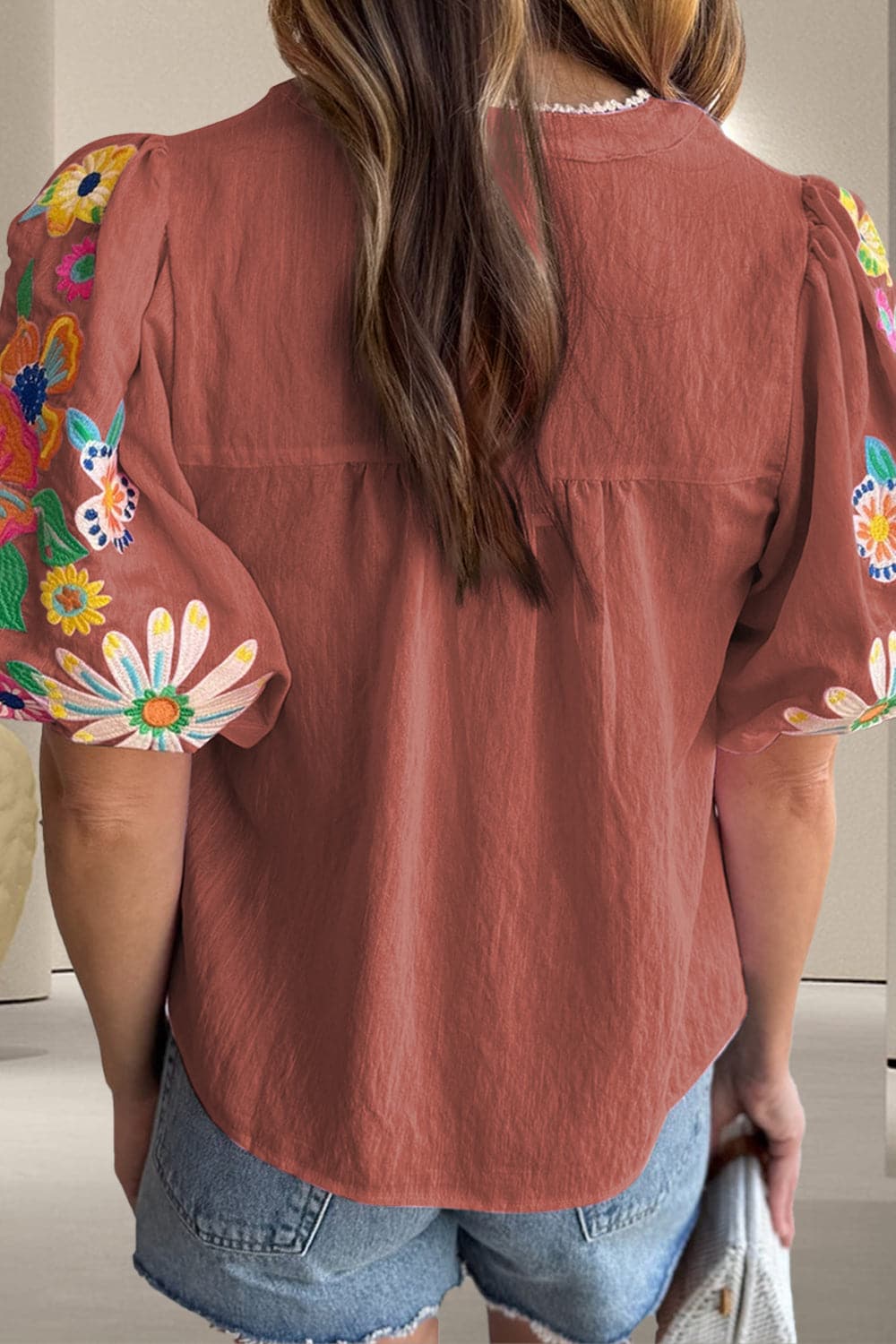 Embroidered Tie Neck Half Sleeve Blouse.