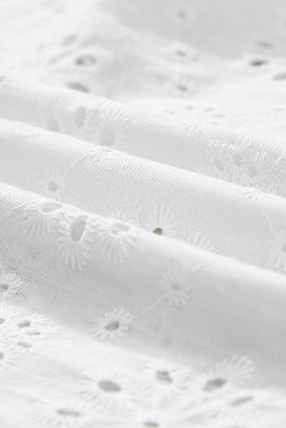 Chic white eyelet embroidered tank for effortless elegance