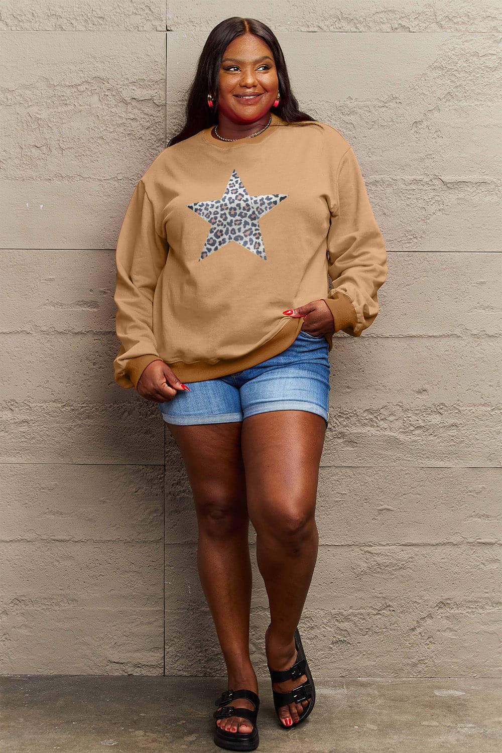 Simply Love Full Size Leopard Star Graphic Sweatshirt.