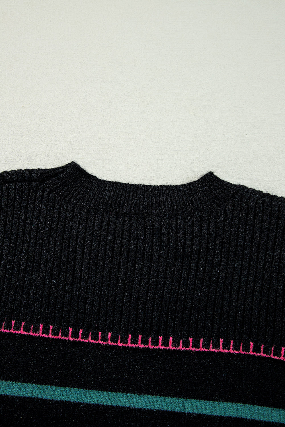 Striped ribbed sweater with colorful accents in black