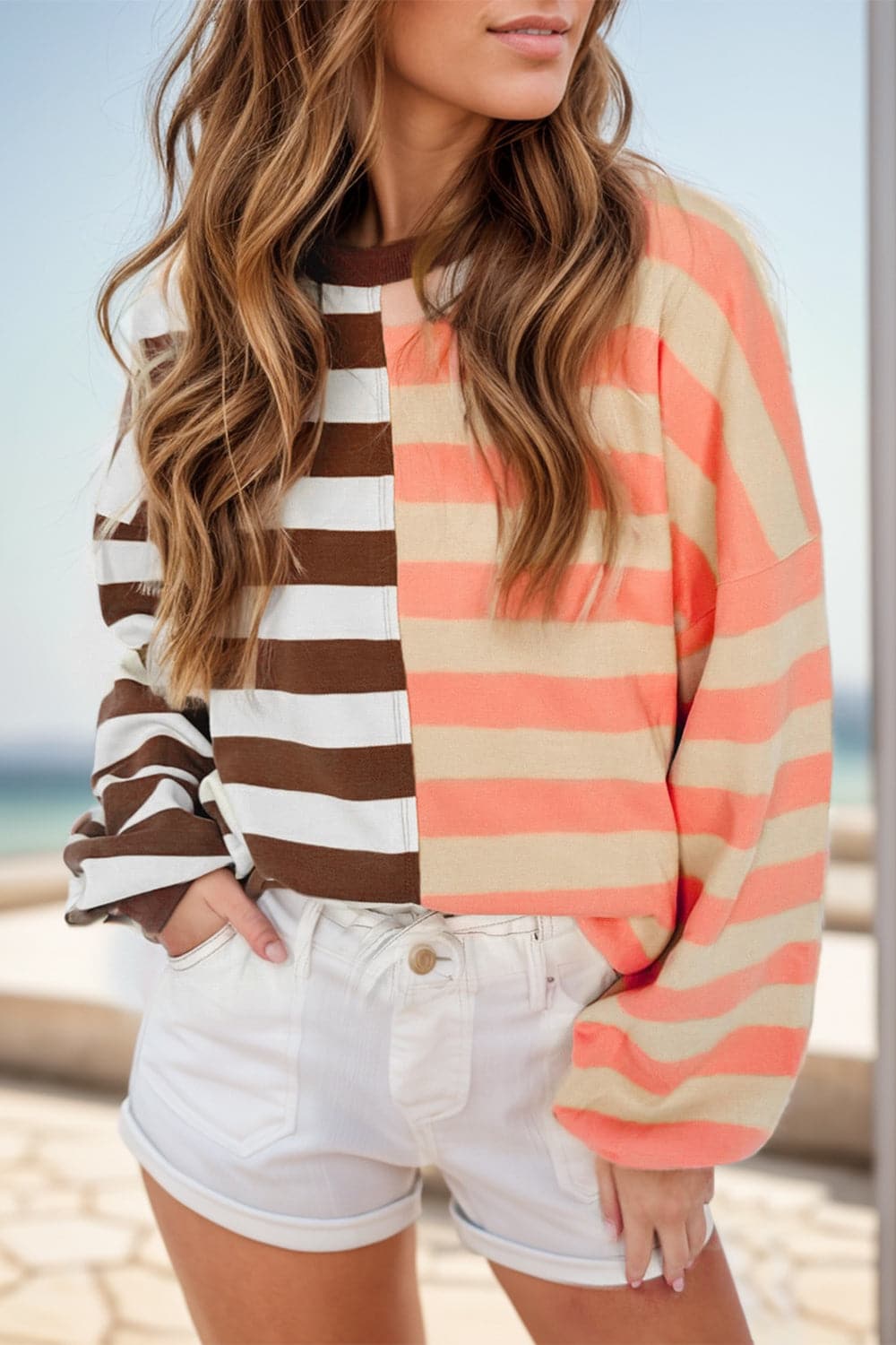 Casual striped sweatshirt with opaque fabric for versatile styling.