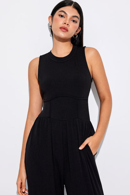 Chic black sleeveless jumpsuit with cinched waist and wide legs