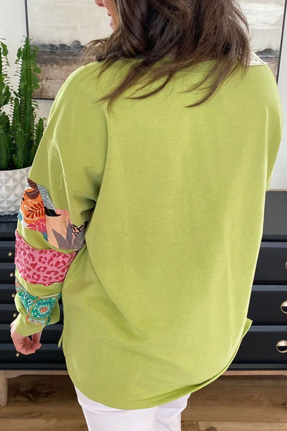 Plus Size Printed Round Neck Long Sleeve Sweatshirt.