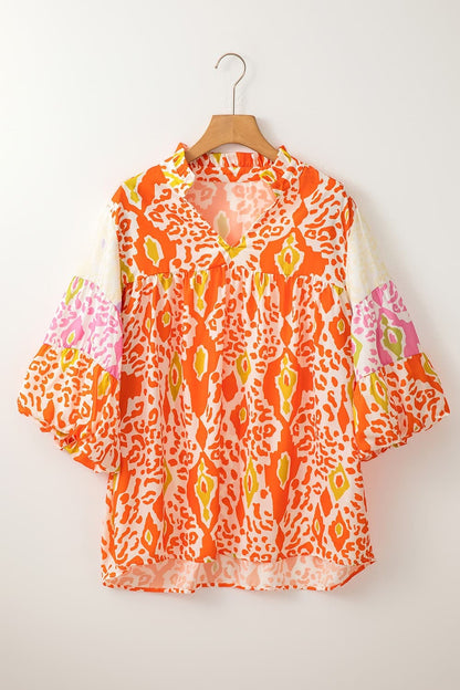 Printed Notched Half Sleeve Blouse.