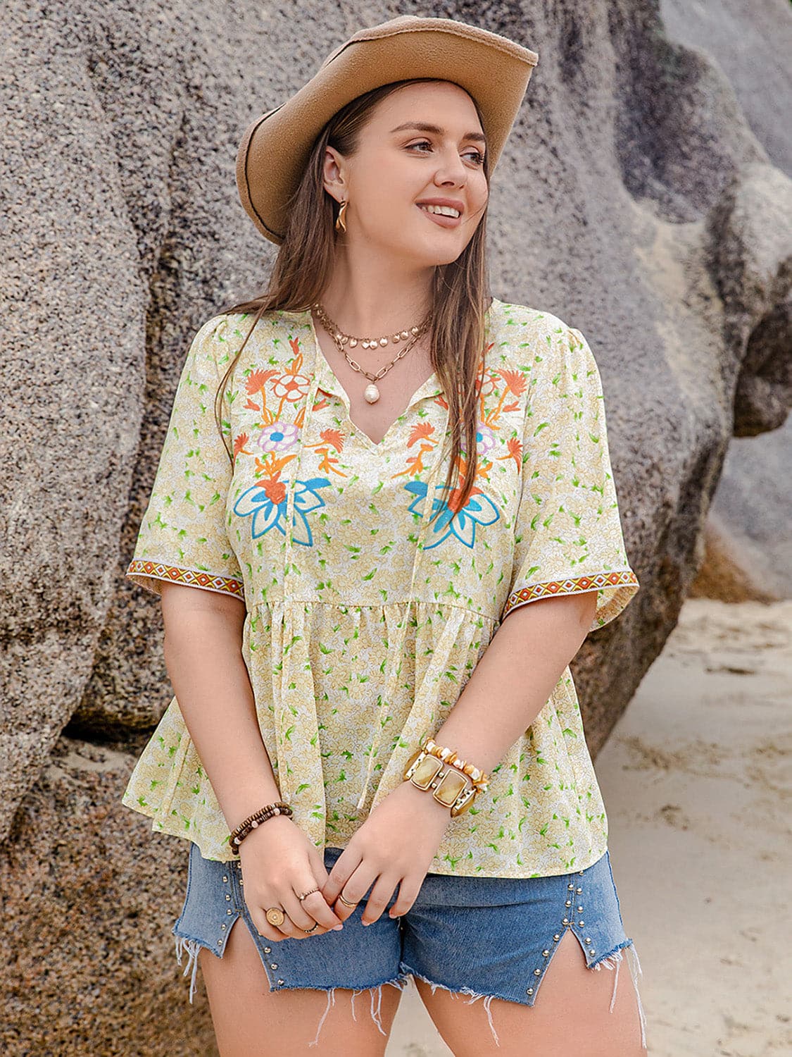 Plus Size Printed Tie Neck Half Sleeve Blouse.