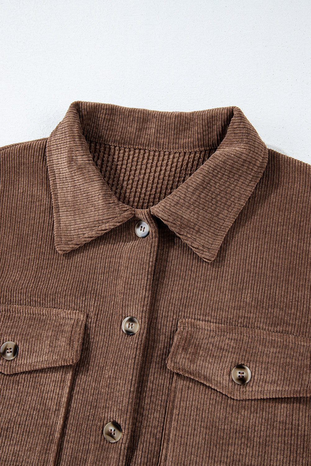 Cozy chestnut corduroy button-up shacket with flap pockets