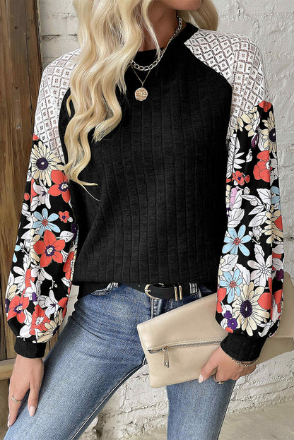 Elegant black floral patchwork ribbed blouse with long sleeves