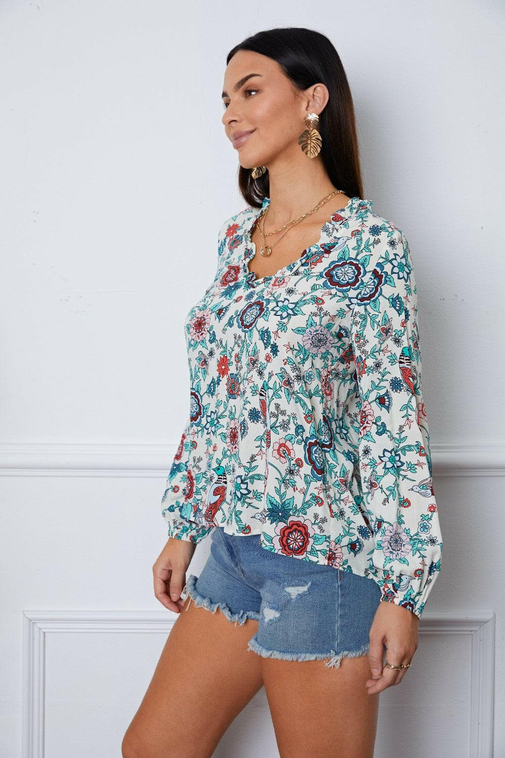 Floral Notched Long Sleeve Blouse.