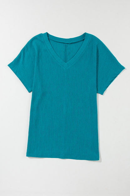 Crinkled blue sapphire V-neck T-shirt with wide sleeves