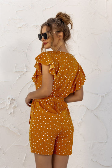 Ruffled Polka Dot Half Button Romper.