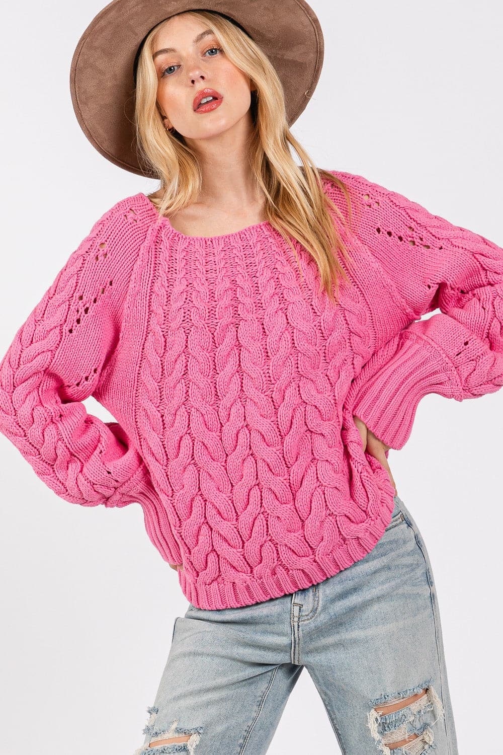 Cozy cable-knit oversized sweater with boat neckline