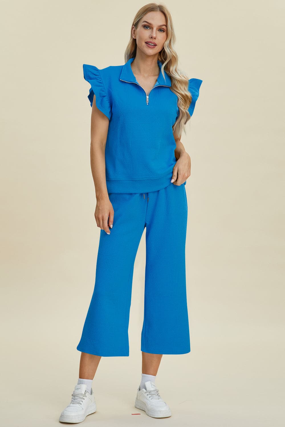 Double Take Full Size Texture Ruffle Short Sleeve Top and Wide Leg Pants Set.