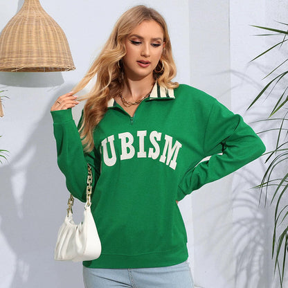 Letter Graphic Half Zip Blouse in green with white text, featuring a stylish design and a chic opaque look.