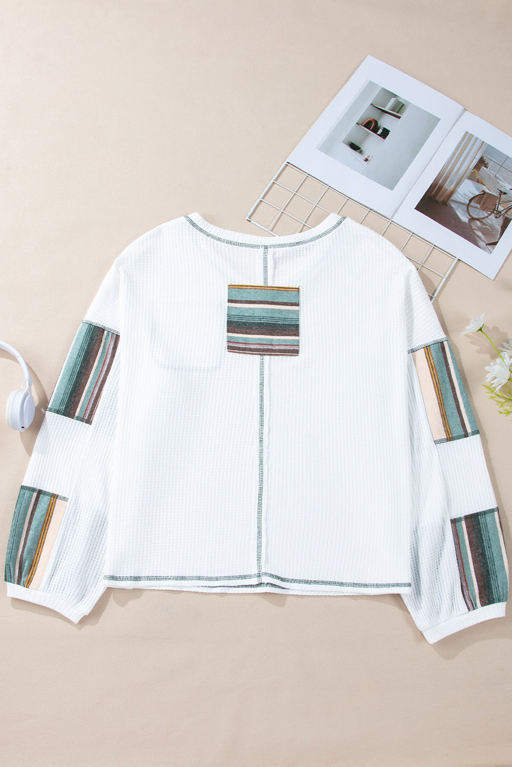 Chic white striped patchwork waffle knit top with exposed seams