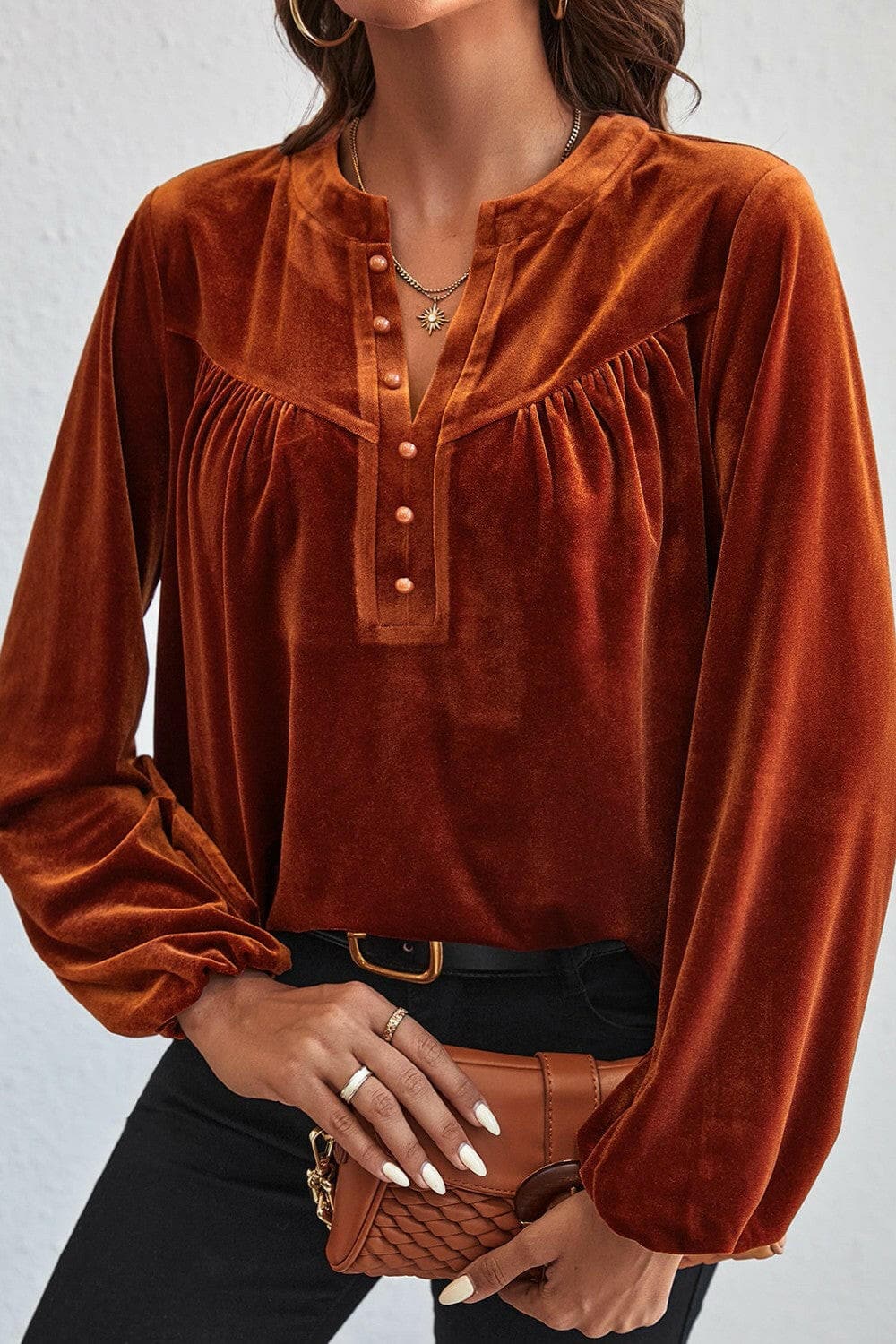 Elegant ruched button notched blouse in rich velvet.