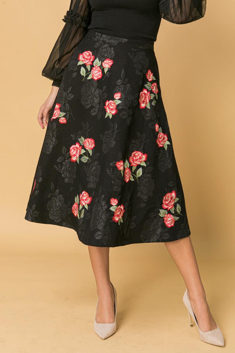 Detailed view of the delicate rose embroidery on the Flying Tomato Midi Skirt, showcasing its intricate, quality craftsmanshi