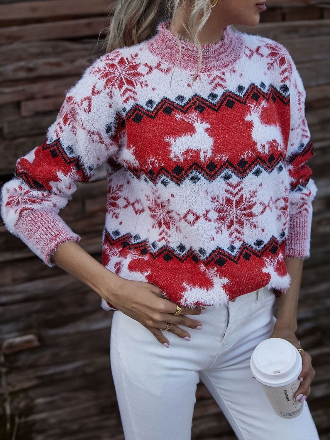 Reindeer & Snowflake Round Neck Sweater.