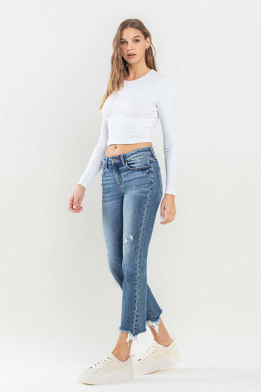 Lovervet Mid Rise Frayed Hem Jeans.