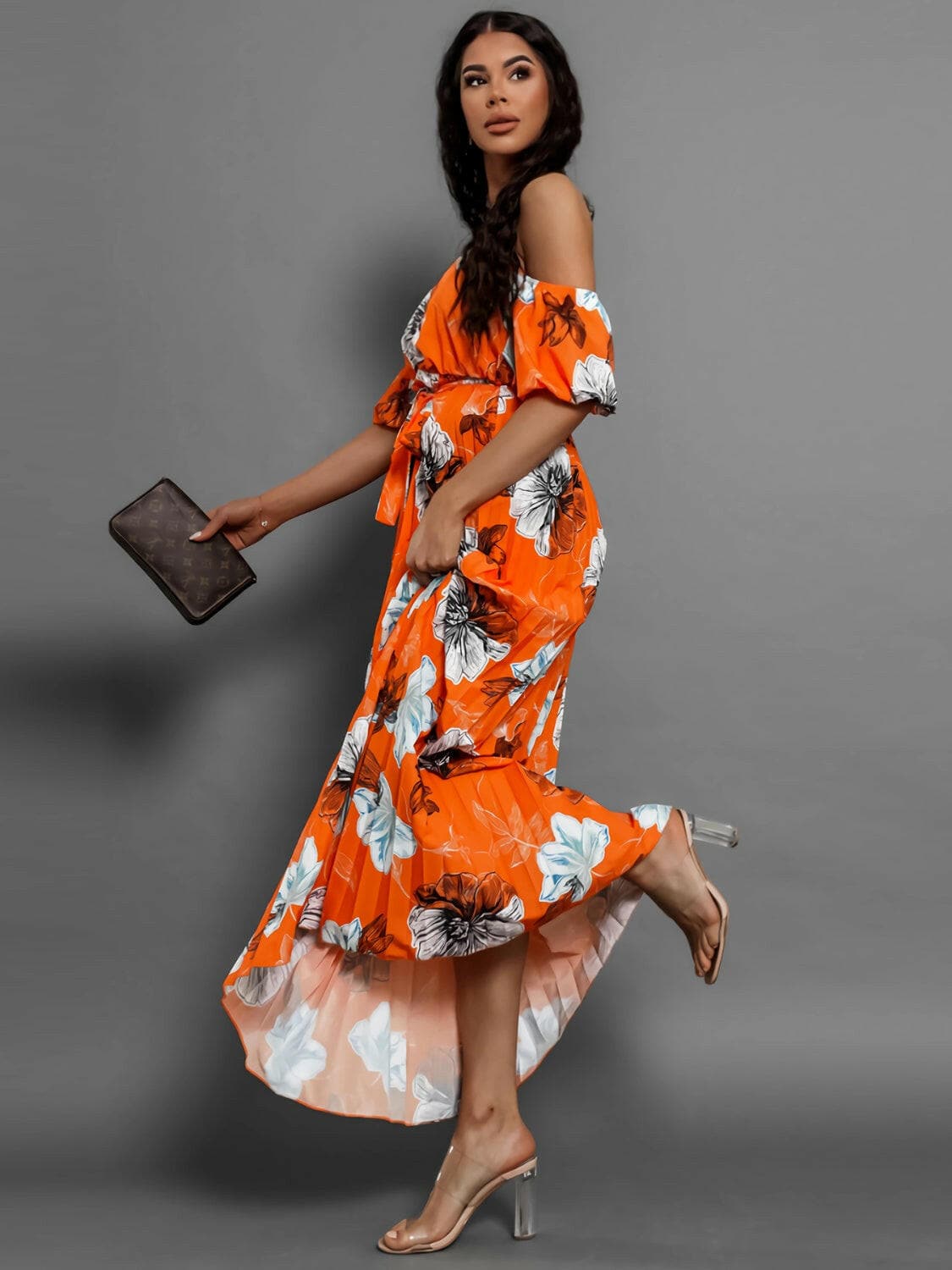 Pleated Floral Off-Shoulder Short Sleeve Midi DressPleated Floral Off-Shoulder Short Sleeve Midi Dress
 Step into elegance with our Pleated Floral Off-Shoulder Short Sleeve Midi Dress. Embrace sophistication effortleLove Salve -Shoulder Short Sleeve Midi Dressjust arrived