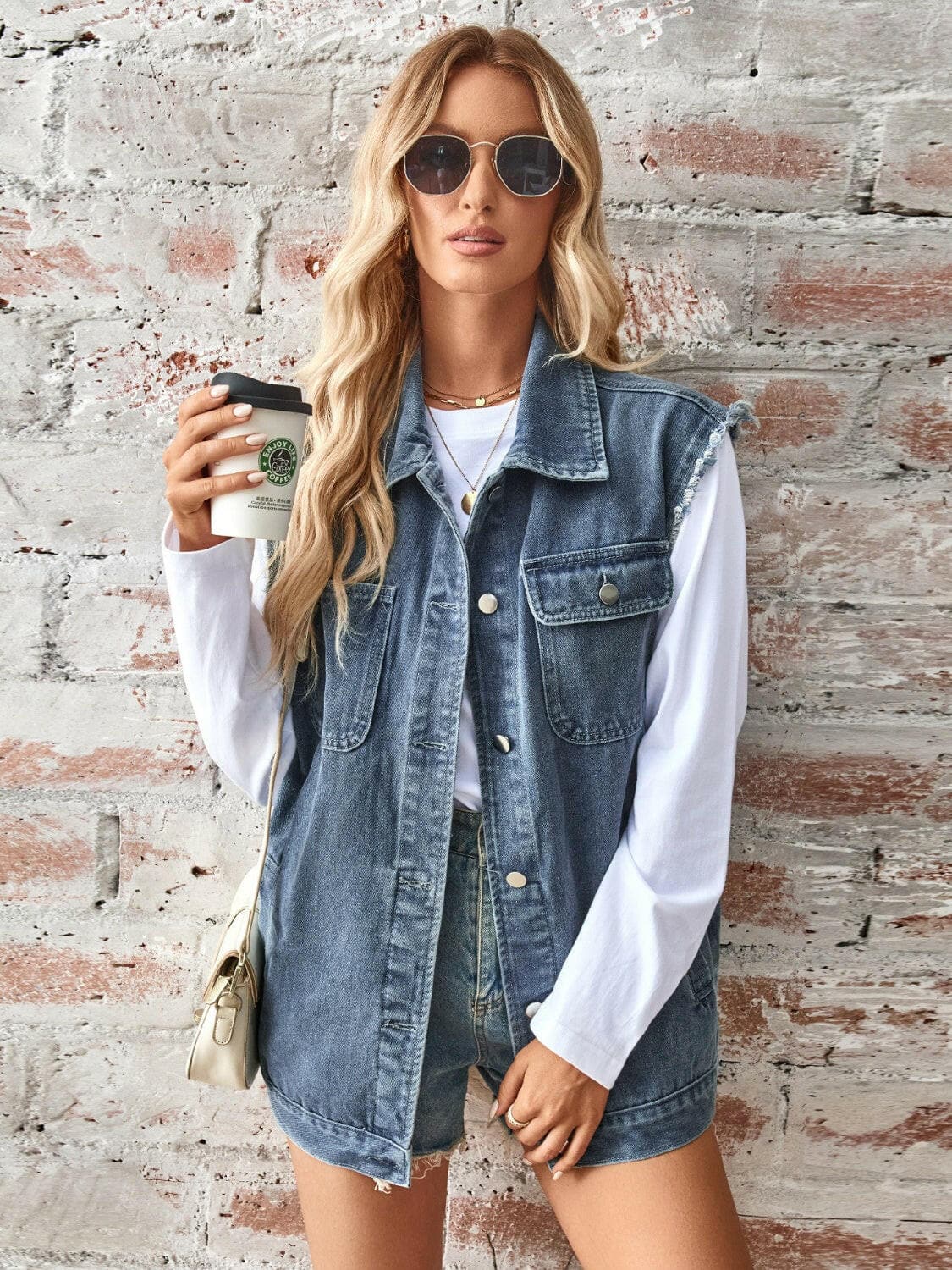 Raw Hem Sleeveless Button Up Denim Jacket.