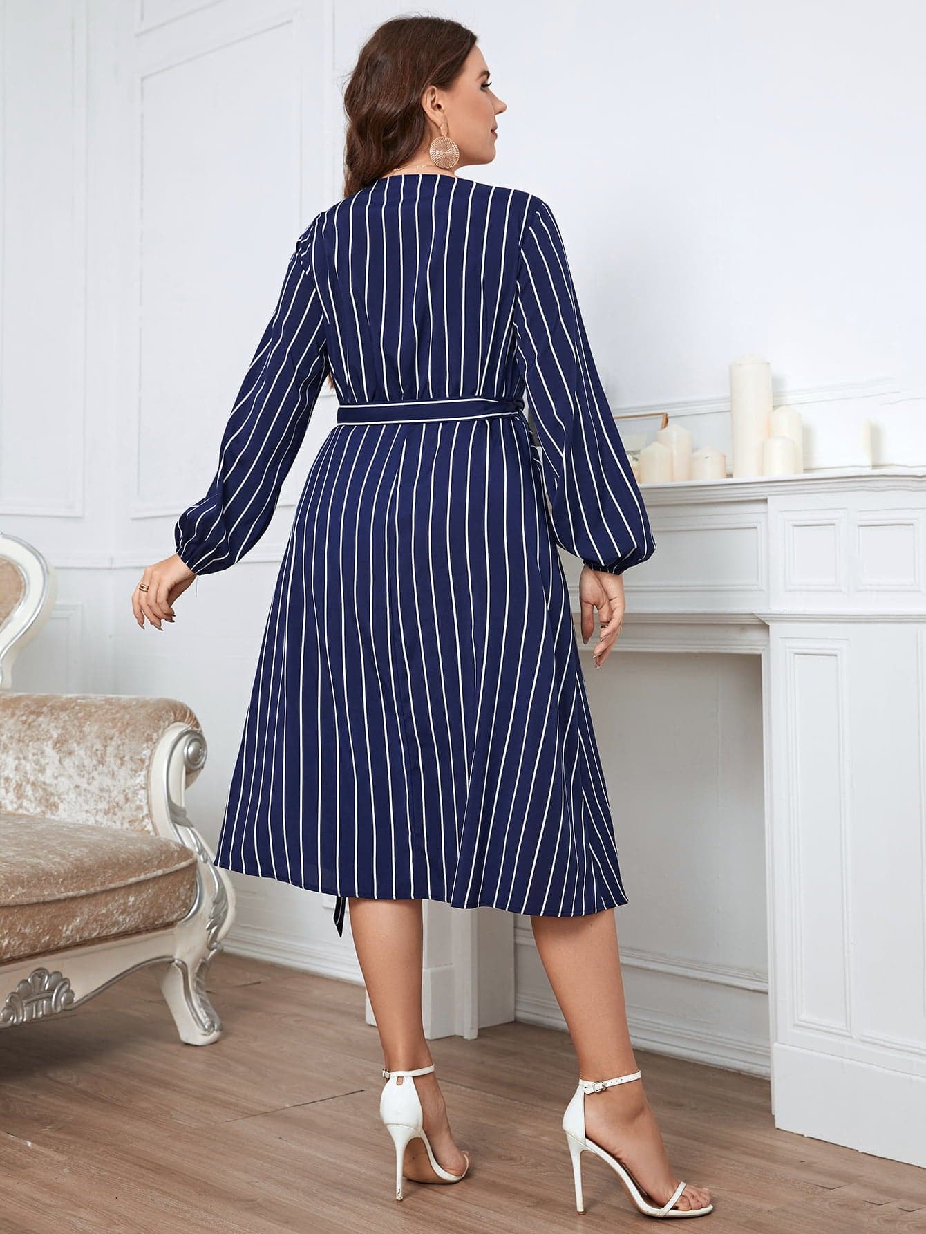 Melo Apparel Plus Size Striped Surplice Neck Long Sleeve Dress.