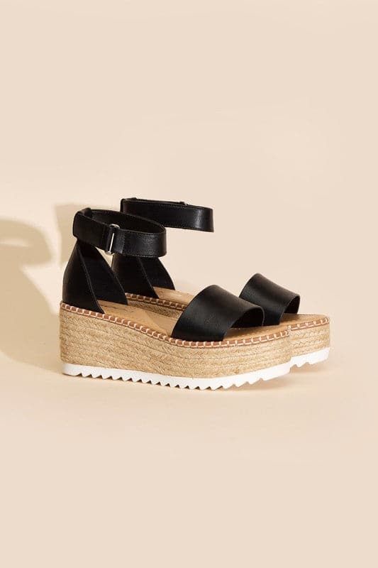 TUCKIN-S PLATFORM SANDALS.