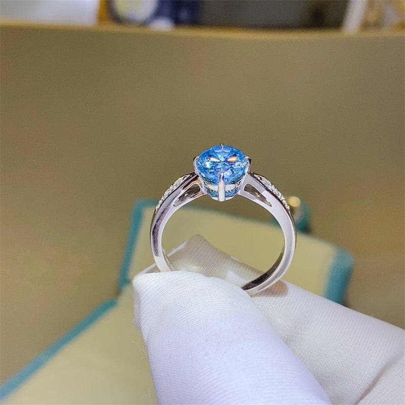 2 Carat Moissanite Sterling Silver Ring with Zircon Detail.