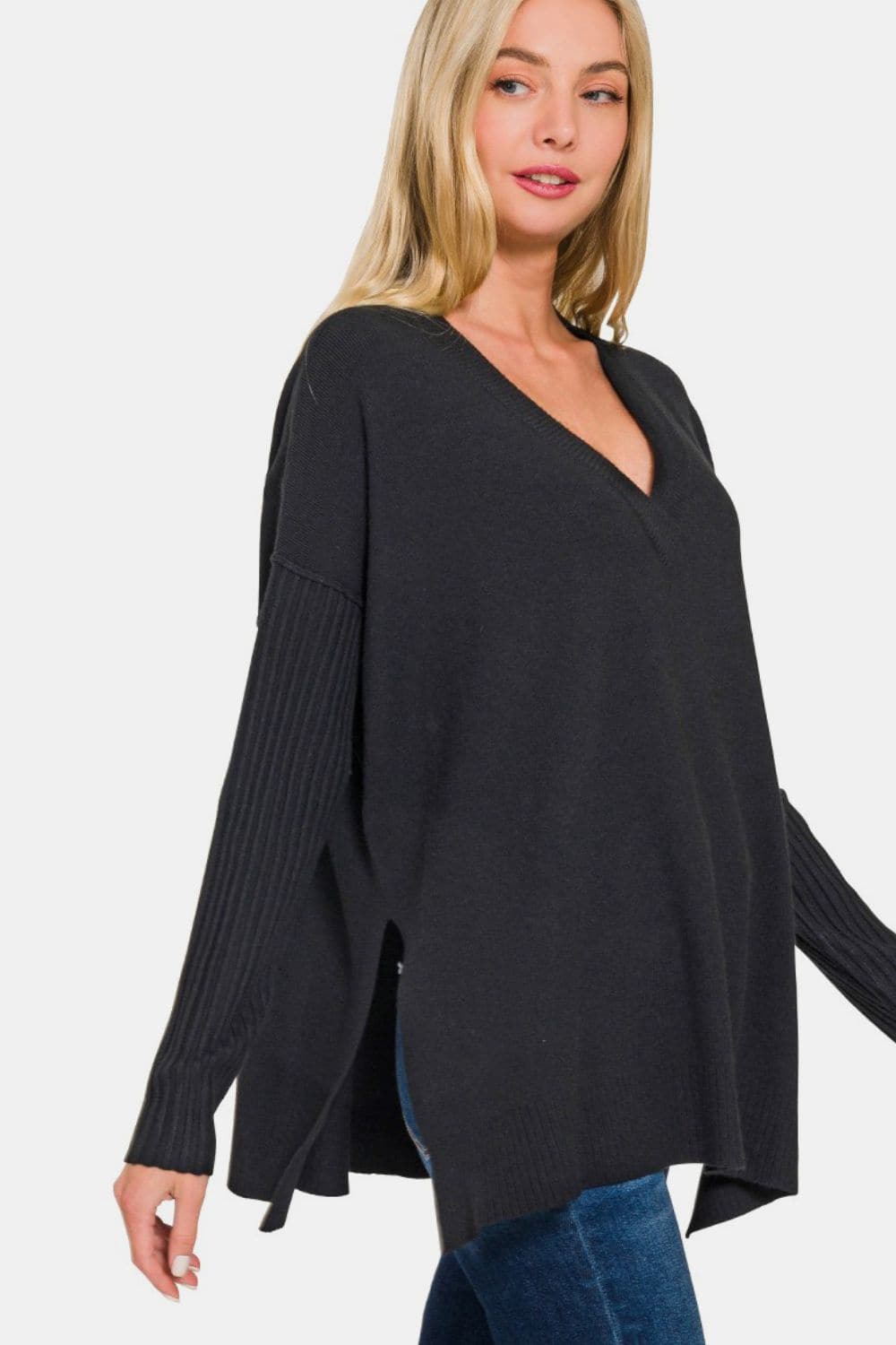 Chic V-neck high-low sweater with trendy side slits