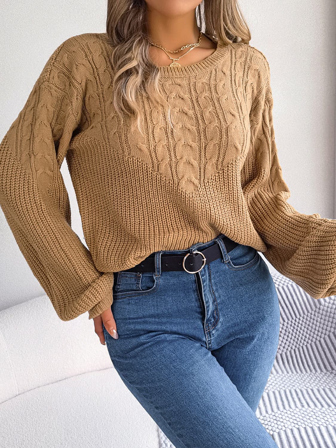 Cable-Knit Round Neck Drop Shoulder Sweater.