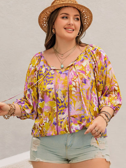 Plus Size Printed Tie Neck Blouse.