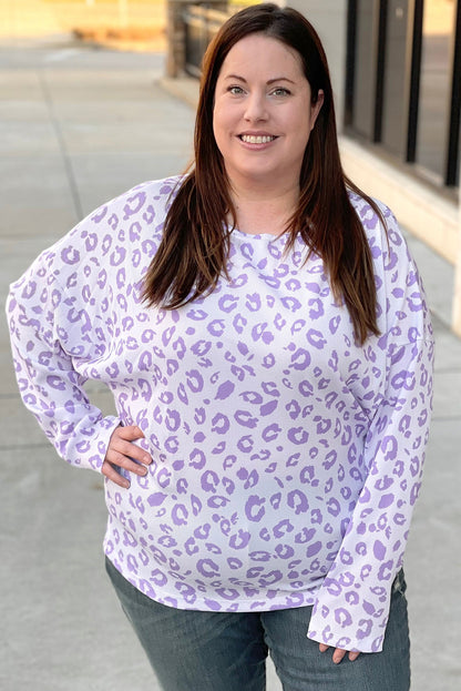 Cozy purple leopard print top with boat neck and drop shoulders